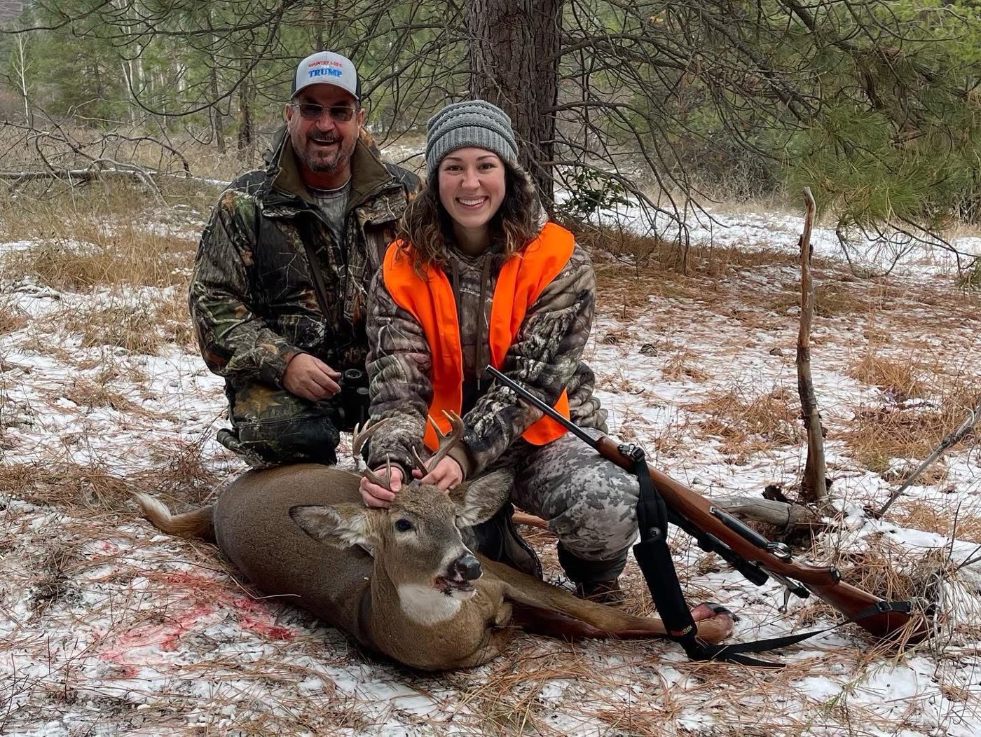 James with his hunting partner and her first buck
